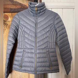 Brand new Michael Kors puffer with bag